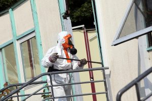 Asbestos being removed from a property